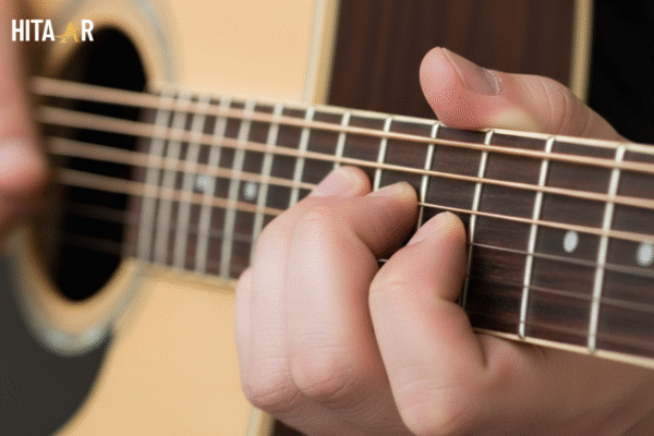 G minor barre chord shape on guitar fretboard for beginners.