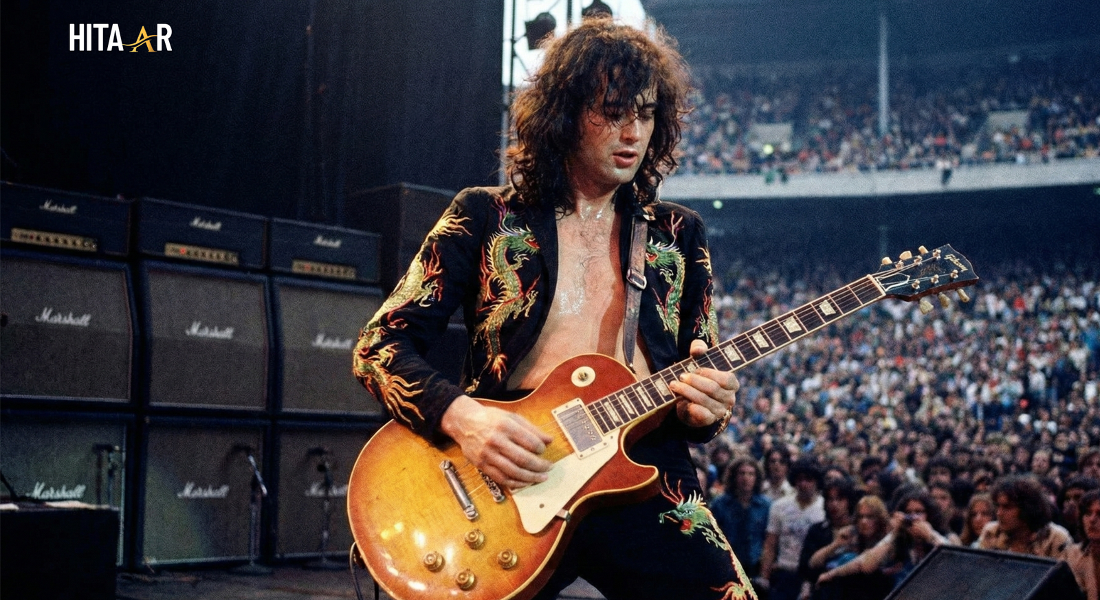 Jimmy Page performing live with his iconic Gibson Les Paul guitar, representing his musical legacy.