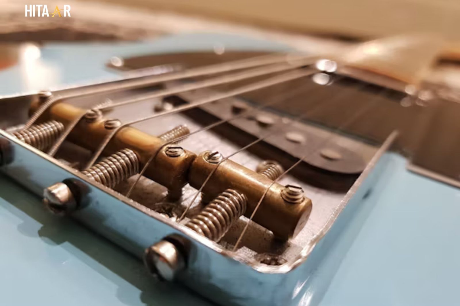 comparison of low vs high action on electric guitar strings