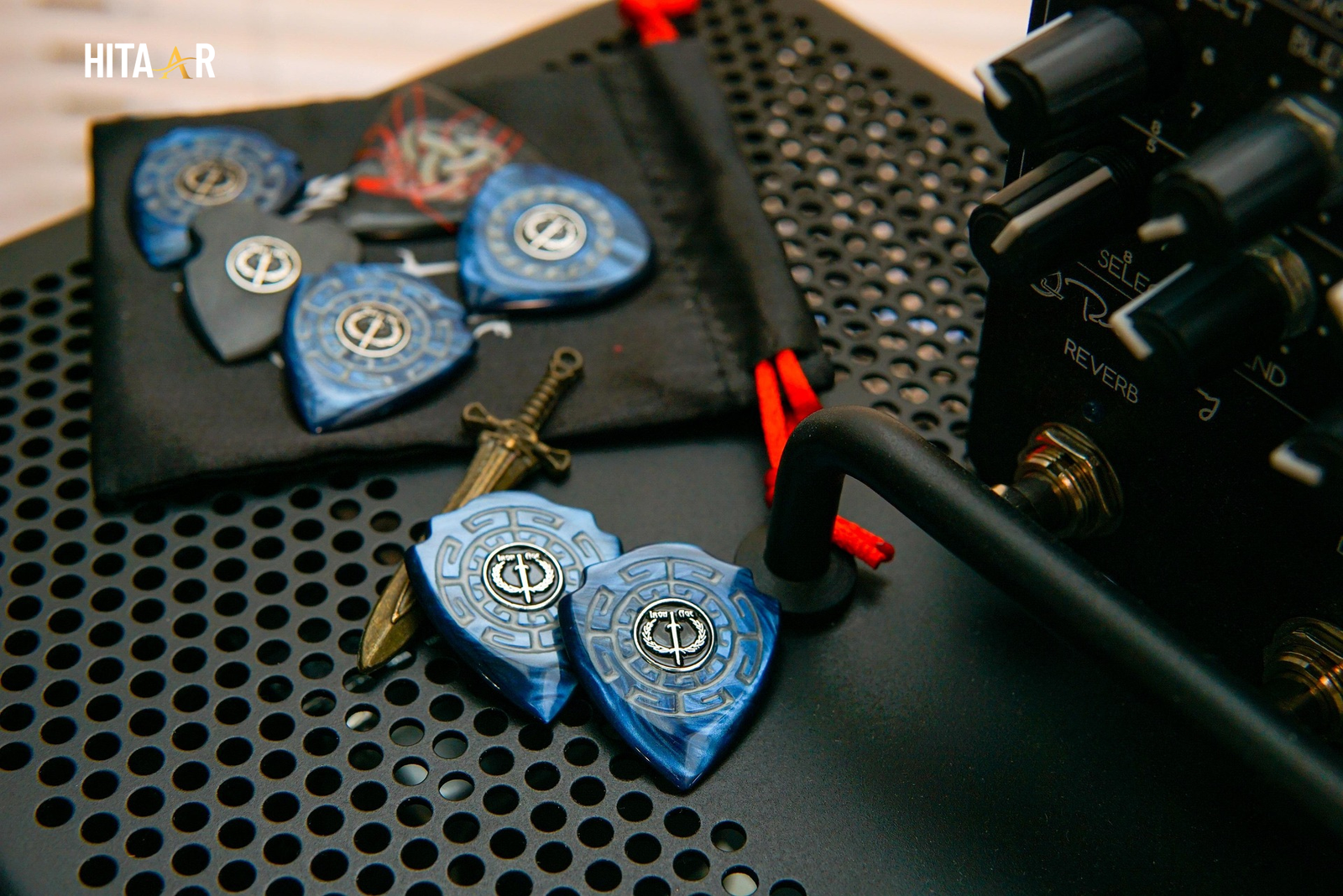 Collection of modern guitar plectrums designed for better grip and tone control.